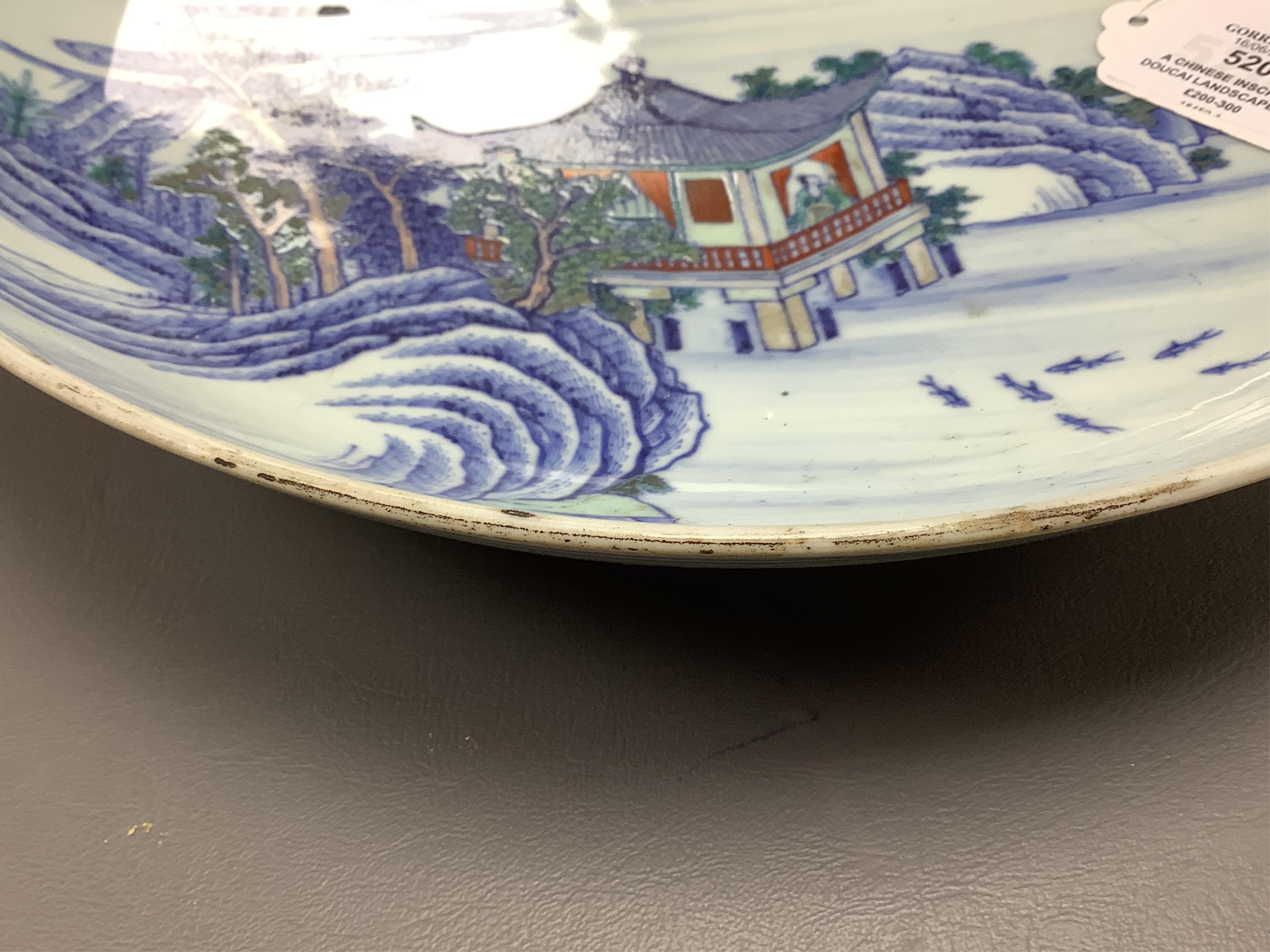 A Chinese inscribed doucai landscape charger, Kangxi mark, possibly Republic period, 33cm